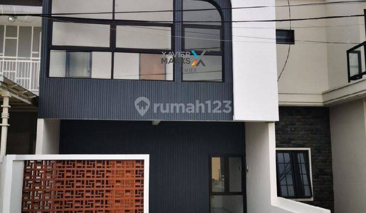 Rumah Baru 2 Lantai Rooftop Cantik di Ikan2 Tasikmadu 1