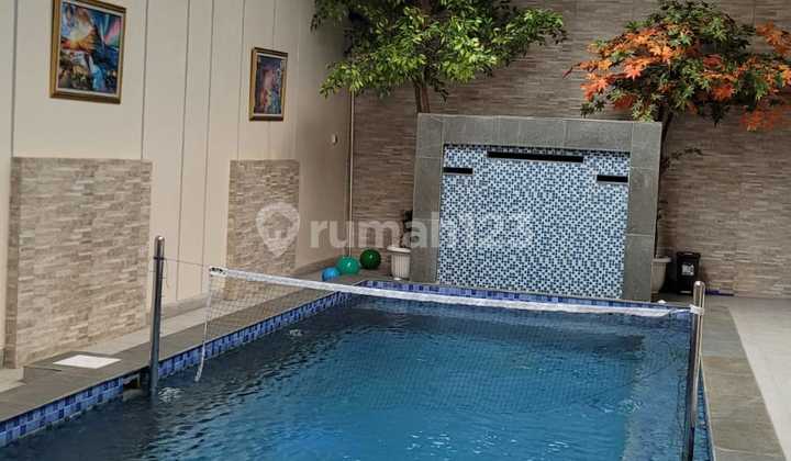 For Rent Semi Furnished House with Swimming Pool Facility in Pondok Kelapa Complex, East Jakarta 2