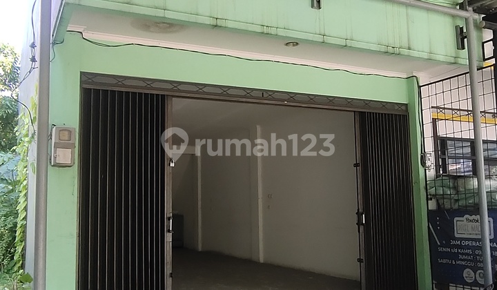 Strategically Located Shop House with Extra Land Bonus on the Side and Back of the Building. 2