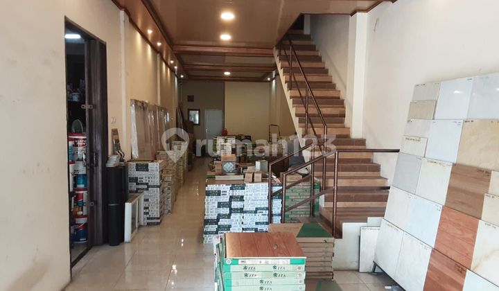 Two-story duplex shop house for sale cheaply in Taman Harapan Baru, West Bekasi.