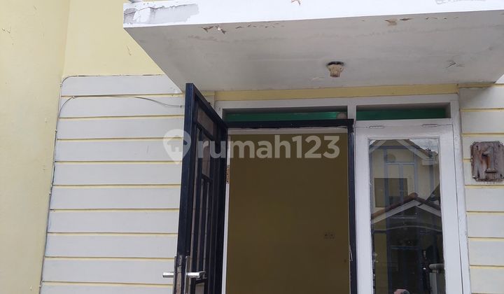 For Rent House With Canopy And Located On Main Road In Citra Raya Tangerang