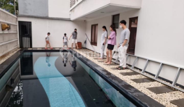 Rumah Permata Buana Luas Tanah 316 M² Luas Bangunan 700 M² Bangunan 3 Lantai Posisi Hoek Kamar Tidur 4+1kamar Mandi 4+1 Furnished Mewah 1 Gudang 2 Ruang Serba Guna 2 Garasi 2 Carport Ada Kolam Renang Selatan Barat Surat Shm Jual 12,5 Milyar Nego