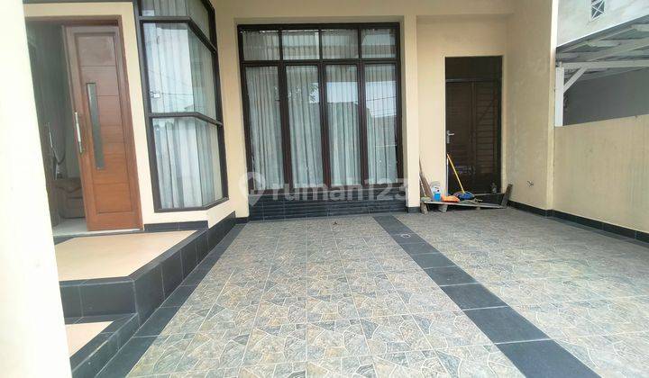 Rumah Mewah 2,5 Lantai di Nusaloka BSD Full Renov Semi Furnished 1