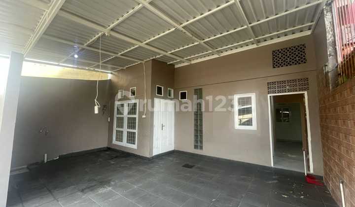 For Rent: 2-Story House in Griya Loka BSD, Well-Maintained and Unfurnished