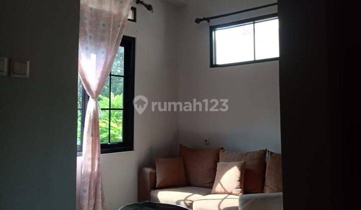 Rumah 2 lantai rapi siap huni dalam cluster kota wisata 2