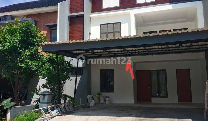 Rumah minimalis 2 lantai rapi siap huni di kota wisata 1