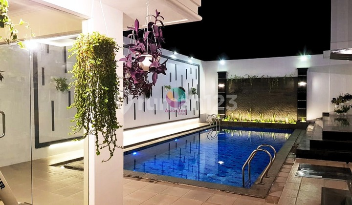 Luxury House + Private Pool in a Strategic Location at Legenda Wisata 2