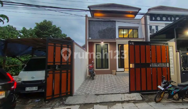 Beautiful 3-Bedroom House in South Wonorejo Rungkut Beautiful 3-Bedroom House in South Wonorejo Rungkut