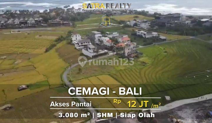 tanah bali dengan akses mobil menghadap jalan raya 1