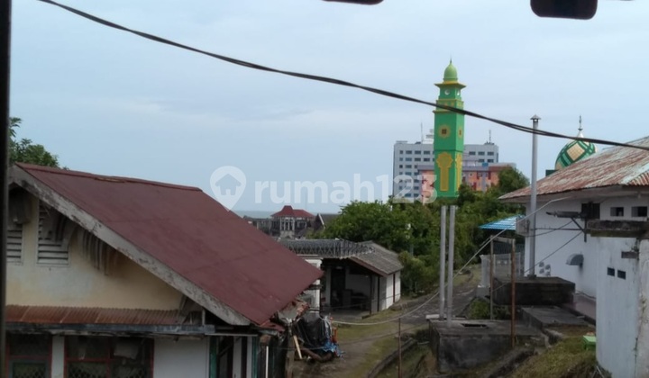 Rumah Tengah Kota Rumah Tengah Kota