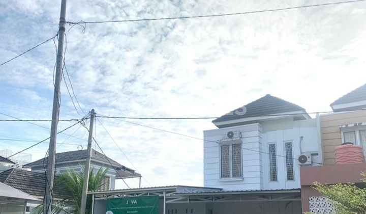 Rumah Pojok 2 Lantai