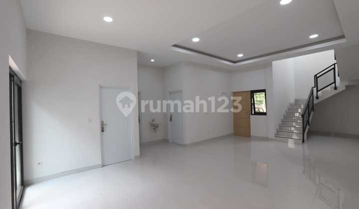 Newly Renovated 2-Story House with SHM, Eligible for KPR in Graha Raya. 2