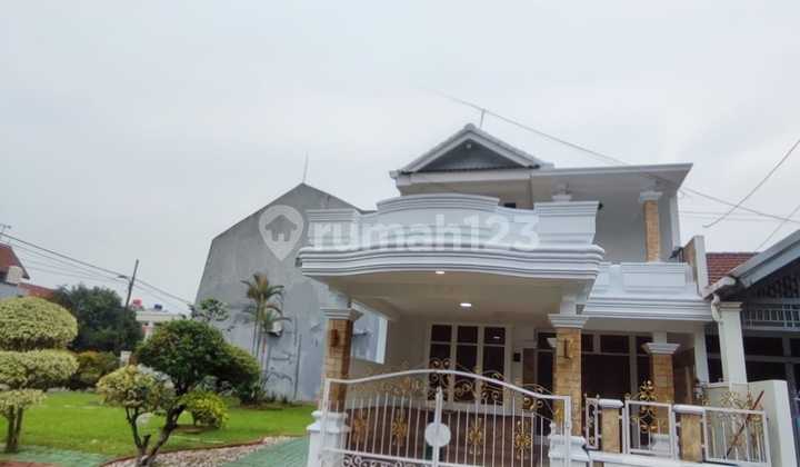 Rumah 2 LT Lokasi Samping Taman Area Parkir Luas di Graha Raya Rumah 2 LT Lokasi Samping Taman Area Parkir Luas di Graha Raya