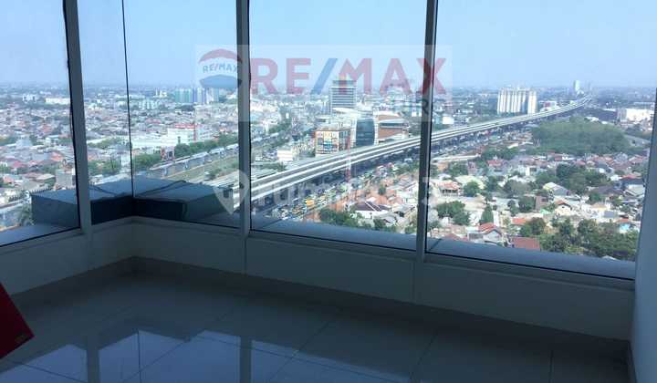 Di Jual satu unit apartemen di Grand Kamala lagoon tower emerald 1