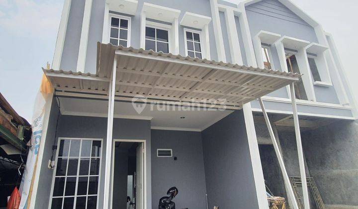 DIJUAL RUMAH 2 LANTAI SIAP HUNI JATIMURNI DEKAT PINTU TOLL JATIWARNA BEKASI 2