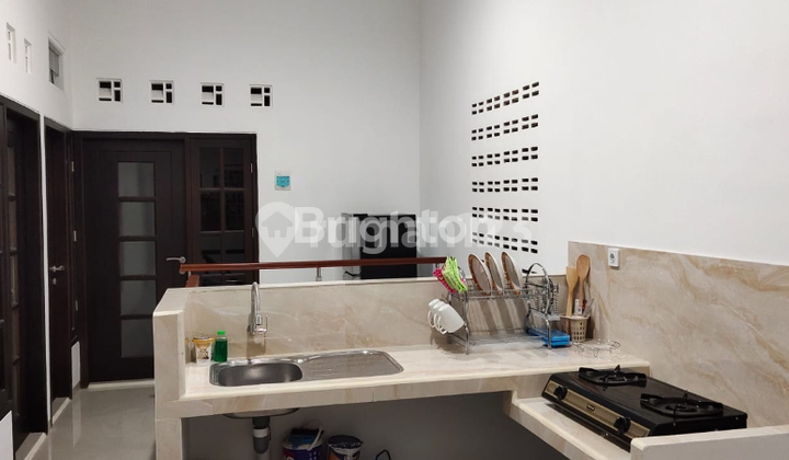 RUMAH KOST 2 LANTAI DEKAT UPN DI JL AMIR MAHMUD  2