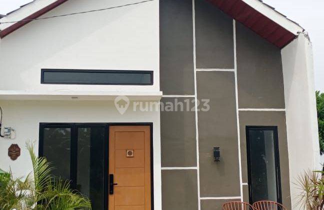 Rumah cluster murah di Sukawangi dp 0% bonus motor beat iphone dan free cicilan selama 1 tahun 1