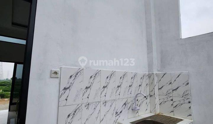 Rumah baru di Tambun dp 0 free cicilan setahun bonus motor 2