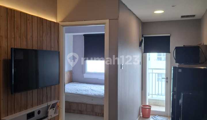 1 Bedroom Well-Furnished with Garden Access at Parahyangan Residence, Including IPL.