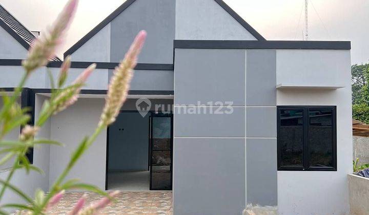 Rumah minimalis bata merah 900 meter ke pintu tol depok 1