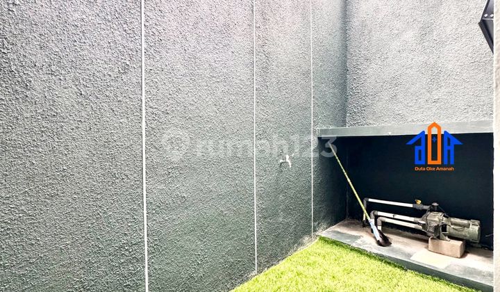 Two-Story Furnished House with Cozy Rooftop Near Pamulang Toll Road