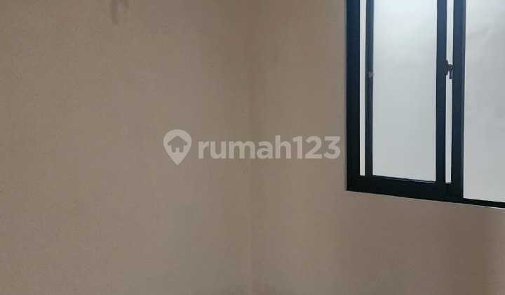MINIMALIST NEW HOUSE BUILT FROM A PLOT IN PUSPA CITRA RAYA GARDEN CLUSTER 2