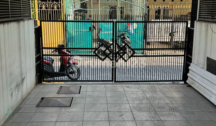 Rumah di Taman Palem