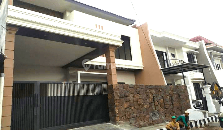 Rumah New Tropical Minimalis di Kertajaya Indah 1