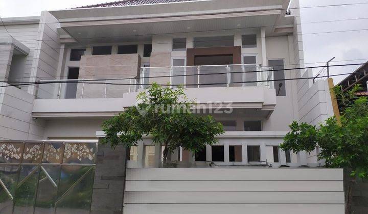 Rumah New Minimalis di Dharmahusada Indah Dekat Raya 1