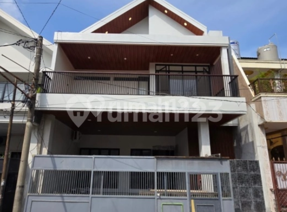 Rumah New Minimalis di Babatan Pantai Barat dekat Sutorejo Rumah New Minimalis di Babatan Pantai Barat dekat Sutorejo