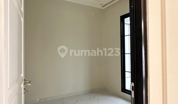 Nice 2-Story House Kencana Loka BSD City Land Area 121 m² Building Area 140 m² 4+1 Bedrooms 3+1 Bathrooms Light Steel Granite Hot Water Installation Air Conditioning in Every Room Canopy Carport for 2 Cars 2200 Watt Electric Pump SHM Certificate Furnished Price 2.7M Negotiable 2