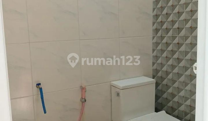 Rumah Hadap Timur 15 Menit ke Stasiun Cisauk Dibantu KPR J-38022 2