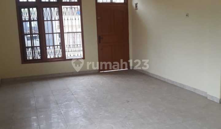 2.5-Story House by the Road with 2-Car Bridge 2