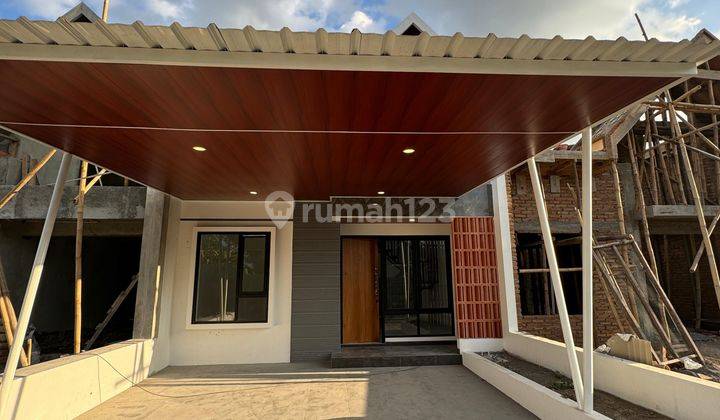 Rumah Asri Cantik Minimalis Modern dalam Perumahan Sleman City  1