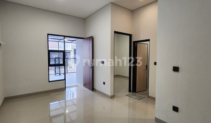 Nice 2-Story 2-Bedroom House in Catalina Gading Serpong - No Brokerage Fee 2