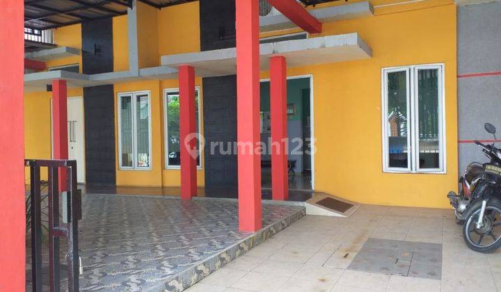 garasi/carport rumah gandeng cocok untuk usaha