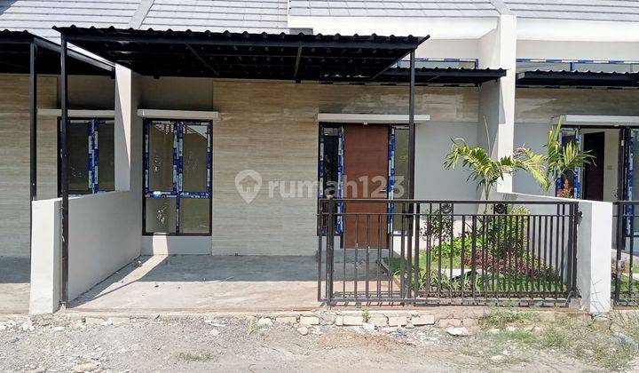 Miliki Rumah Dengan Konsep Villa Dekat Tol Rumah Siap Huni 1