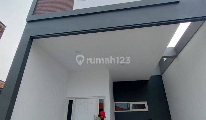 Rumah 2 lantai siap huni di kota surabaya harga 600 jt'an  2