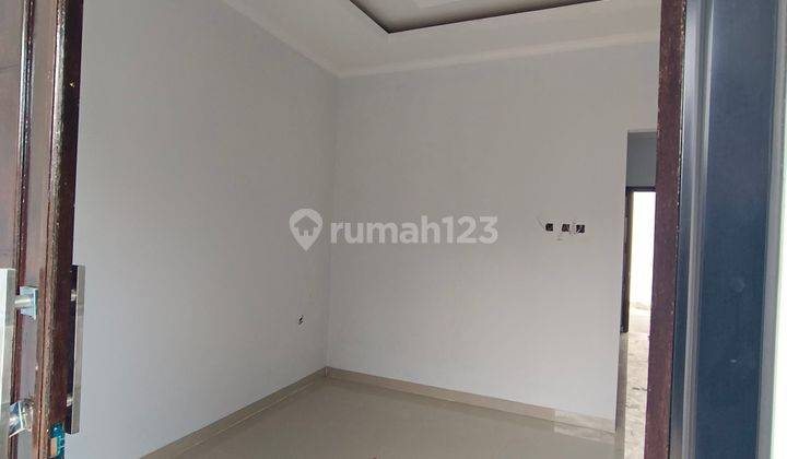 Rumah 2 lantai dekat Alun-alun GDC kota depok tanpa DP 2