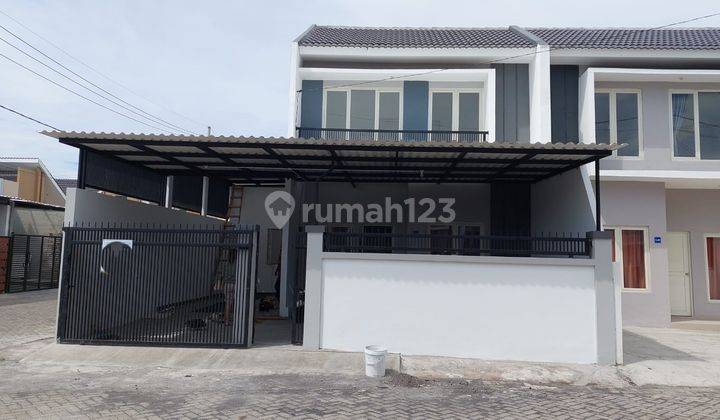 Disewakan Rumah Baru Gress Green Mansion Juanda 1