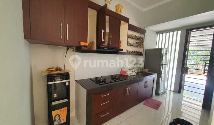 rumah di discovery conserva bintaro,yani
