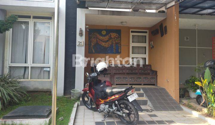 RUMAH  DI TENGAH KOTA 1