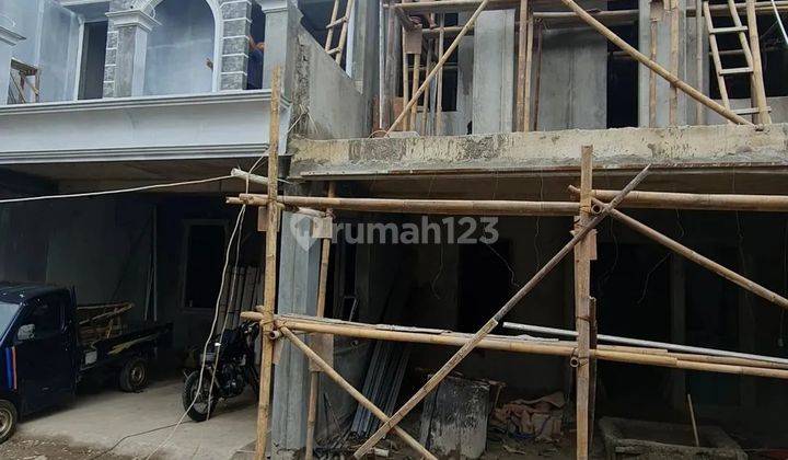 Dijual rumah townhouse di pinggir jalan raya srengseng sawah 2