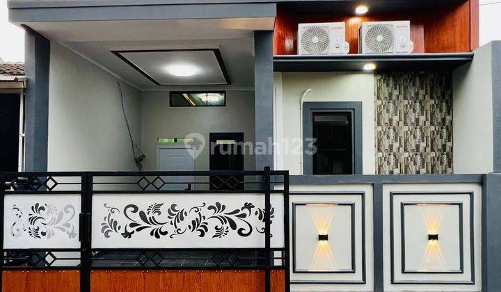 Rumah cantik siap huni full renovasi di citra indah city  1