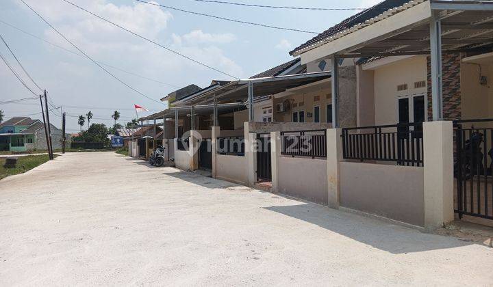 Rumah modern Lingkungan Nyaman.Bonus AC.Tengah Kota 2