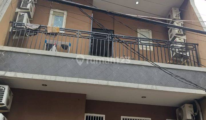 Jual Rumah Kost Grogol 20 Kamar, 4 Lantai Belakang Untar SHM 1