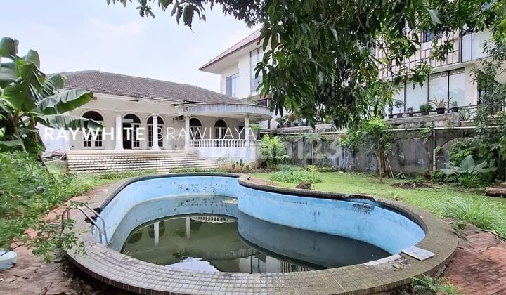 rumah lama zana komersil  lokasi pinggir jalan raya ampera 2