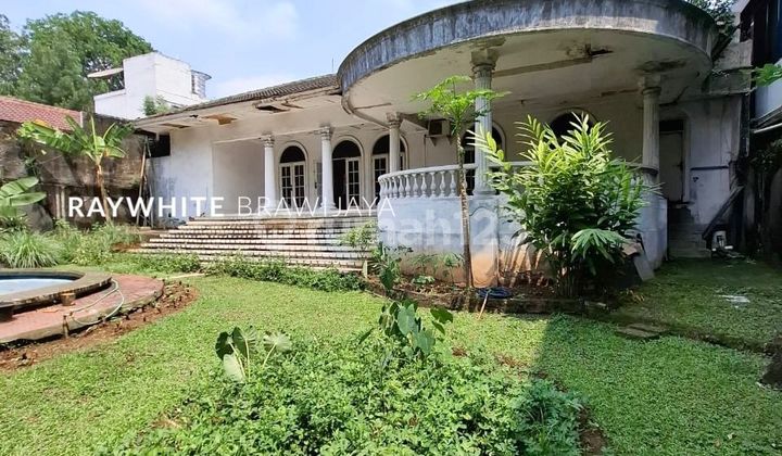 rumah lama zana komersil  lokasi pinggir jalan raya ampera