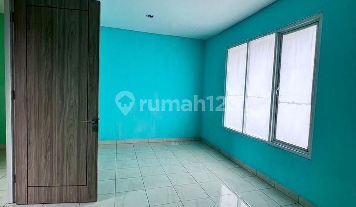 rumah modern minimalis di perumahan cempaka hijau