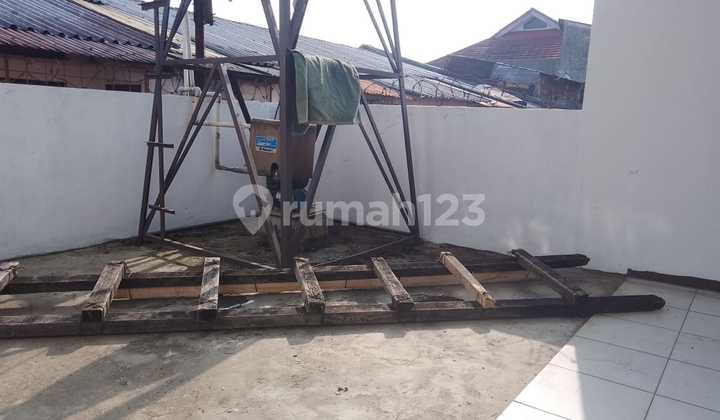 rumah terawat nyaman di tengah kota turangga 2